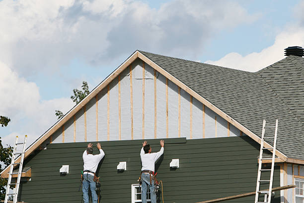 Professional Siding Contractor technician working in Collins, OH
